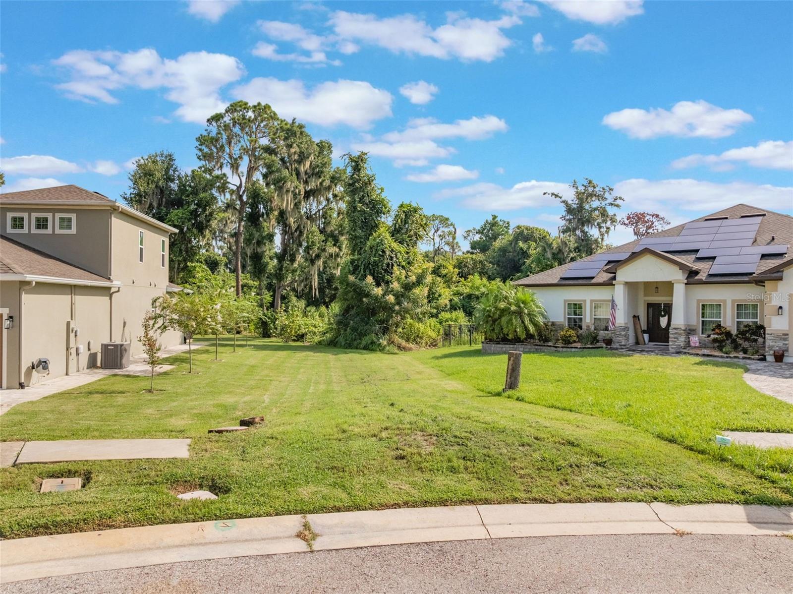 Rare find within the 24-hour guard-gated community of Westyn Bay; a Tuscan-themed residential community located in Ocoee, Florida, on the southeastern shore of Lake Apopka. It is known for its resort-style amenities, proximity to major roadways, and family-friendly atmosphere. The neighborhood includes both single-family homes and town homes where residents can enjoy a wide variety of amenities, including a 24-hour guard-gate, a clubhouse, a swimming pool with a beach entry and a splash pad, a sand volleyball court, tennis courts, basketball courts, and soccer fields. The neighborhood is situated off Ocoee Crown Point Parkway. Location offers easy access to major expressways, including Highway 50, the Florida Turnpike, and the 429, making commutes to Downtown Orlando and local theme parks like Disney World relatively fast. There is no time frame to build and you can bring your own preferred builder and this is one of two remaining building lots within this sold out community.