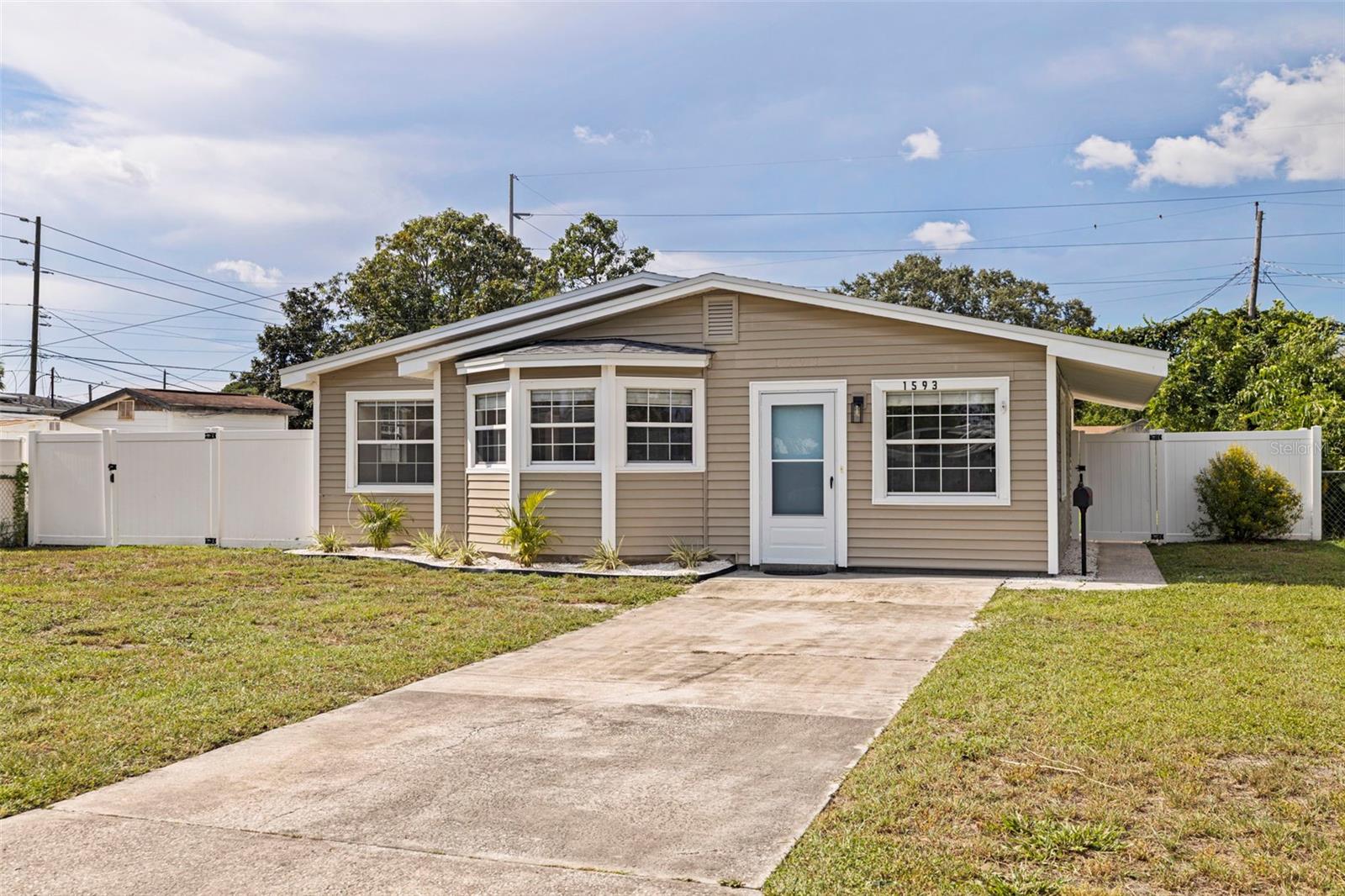 Welcome to this charming, move-in-ready home in the heart of St. Petersburg! This home has never experienced flooding or storm damage, providing year-round peace of mind. Plus, flood insurance is affordably priced at approximately $1,450 per year. This beautifully updated three-bedroom, one-bathroom residence offers a perfect blend of comfort, style, and convenience. Ideally located in a desirable neighborhood close to everything you need, it’s an excellent option for first-time homebuyers or those looking to downsize. The thoughtfully designed floor plan makes everyday living easy, and recent upgrades add modern appeal and long-term value. Notable improvements include a brand-new roof (2024), new water heater (2025), HVAC system (2021), updated flooring throughout, fresh interior paint, and new vanities, fixtures, and appliances. Outside, the fully fenced yard adds both privacy and space for outdoor enjoyment. You'll also appreciate the quick access to I-275 in both directions, making commutes and travel effortless. Everyday essentials are just minutes away, and nature lovers will enjoy being less than a mile from Sawgrass Lake Park—a serene escape perfect for walks and outdoor activities. Don’t miss the opportunity to own this stylish, move-in-ready home in a prime location—schedule your showing today!
