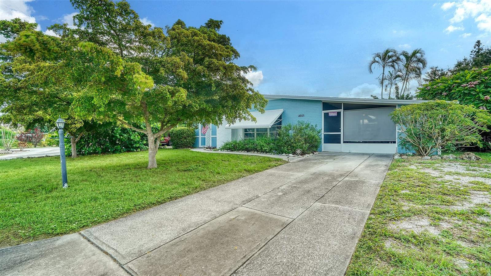 Situated in the heart of West Bradenton, this charming 2/1 is waiting for you! This home has such features as: a recently screened-in carport, a beautiful stone fireplace, a bright and sunny Florida room which flows into an inviting back patio, a new water heater and a newer electric panel. This home is a short walk or bike ride to grocery stores, shopping, dining, schools and G.T. Bray Recreation Center which offers endless outdoor leisure activities, indoor and outdoor sports, dog parks and walking trails. Wouldn’t it be nice to be such an easy distance from all this and be only a few miles from the pristine beaches of Anna Maria Island? Don’t miss out on this opportunity. Schedule your showing today!