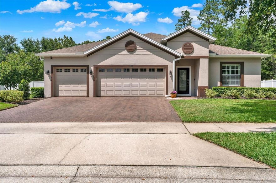Step into this beautifully maintained four-bedroom, three-bath home in the sought-after Saddlebrook community of DeLand. Designed with a split-bedroom floor plan, it offers both privacy and versatility, while the open-concept layout creates an inviting space perfect for everyday living and entertaining. Primary retreat features his and hers walk-in closets for ample storage. The heart of the home is the spacious kitchen that includes expansive walk-in pantry and oversized island—ideal for gathering, meal prep, or casual dining. Just beyond, the dining area features elegant built-in shelving, blending style with functional storage. Prepare to be amazed when you walk outdoors to your own private, serene retreat. A large deck with a retractable awning provides the perfect spot to relax, overlooking a tranquil backyard complete with a peaceful waterfall and koi pond. The home backs to a protected conservation area, ensuring undisturbed views and no rear neighbors. Recent updates add even more value, including a NEWER HVAC system (November 2025), BRAND-NEW sod, and a NEWER pond pump (September 2025). Residents of Saddlebrook enjoy access to community amenities such as a resort-style pool and playground. With tree-lined sidewalks, mature landscaping, and convenient access to I-4, shopping, dining, and the charm of historic downtown DeLand, recently voted #2 best small towns, this location offers both comfort and convenience. Don’t miss this opportunity to own in one of DeLand’s most desirable neighborhoods—this home is a must-see!