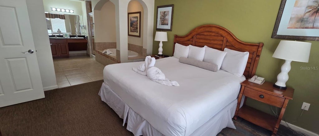 Photo of 8125 Resort Village Drive #51408, Orlando, FL 32821 (MLS # O6453373)