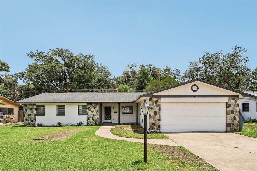 One or more photo(s) has been virtually staged. FULLY RENOVATED ~ SINGLE STORY ~ POOL HOME in Evergreen Terrace delivers the modern updates, OPEN CONCEPT layout and central Orlando location you have been looking for with the added bonus of NO HOA! In addition to the interior renovation, recent updates include FRESH EXTERIOR PAINT (2026), a NEWER A/C (2021), and the pool resurfaced within the last five years, giving peace of mind from the moment you arrive. This solid BLOCK HOME features a true 4-bedroom floor plan featuring a PRIMARY SUITE, LUXURY VINYL PLANK flooring throughout and a light, bright open layout design that feels fresh and inviting. At the heart of the home is a beautifully redesigned kitchen ideal for both everyday living with family and entertaining friends, complete with desirable shaker-style cabinetry, on trend complementary countertops and backsplash, STAINLESS STEEL APPLIANCES, pendant lighting, SLIDING BARN DOORS on the pantry and a large center ISLAND with casual bar seating perfect for hosting. The kitchen flows seamlessly into the living and dining areas, while sliding glass doors open to the large SCREENED LANAI and private OPEN AIR POOL, creating effortless indoor/outdoor Florida living. The FENCED BACKYARD, mature trees and spacious outdoor areas offer room to relax, entertain and enjoy year-round sunshine. Whether you are looking for a first home, a primary residence or a strong investment opportunity, this property checks all the boxes with its desirable updates, functional floor plan and unbeatable convenience. Located in between a Sam’s Club and Target and just minutes from SR 50, 551, 417, Downtown Orlando, Winter Park, Oviedo, East Orlando, Vista East and the Orlando International Airport – you are close to shopping, dining, parks, entertainment and major employers. Zoned for “A” RATED Glenridge Middle School and Winter Park High School, this renovated pool home offers the perfect combination of style and location. Call today to schedule a tour!