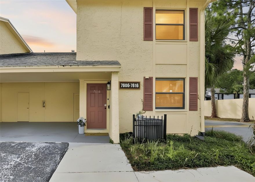 One or more photo(s) has been virtually staged. Tucked inside The Greens of Town ’n’ Country, this 3-bedroom, 2.5-bath end-unit townhome delivers space, style, and smart functionality in all the right places.

The first floor welcomes you with new tile flooring throughout, an updated kitchen with granite countertops, stainless steel appliances, and generous cabinet space, and a refreshed half bath with a new vanity, mirror, and lighting. Wood stairs add warmth and character as you head upstairs, where laminate flooring continues throughout for a clean, cohesive look.

Upstairs living is thoughtfully designed. The primary suite features two walk-in closets, a remodeled bathroom, and ample linen storage. Both secondary bedrooms also include walk-in closets, offering storage rarely found in townhomes. The hall bath has been remodeled, and the washer and dryer are conveniently located upstairs, along with an additional linen closet and extra storage.

Step outside to a private, fenced patio, a rare feature ideal for quiet mornings or relaxed evenings. An exterior storage closet in the carport, one covered parking space, and additional parking directly in front add to the home’s everyday convenience.

With multiple recent updates, included community services covering the community pool, exterior and ground maintenance, water, sewer, and trash, and a location just minutes from the Veterans Expressway, Tampa International Airport, shopping, and dining, this townhome is truly move-in ready and easy to love.