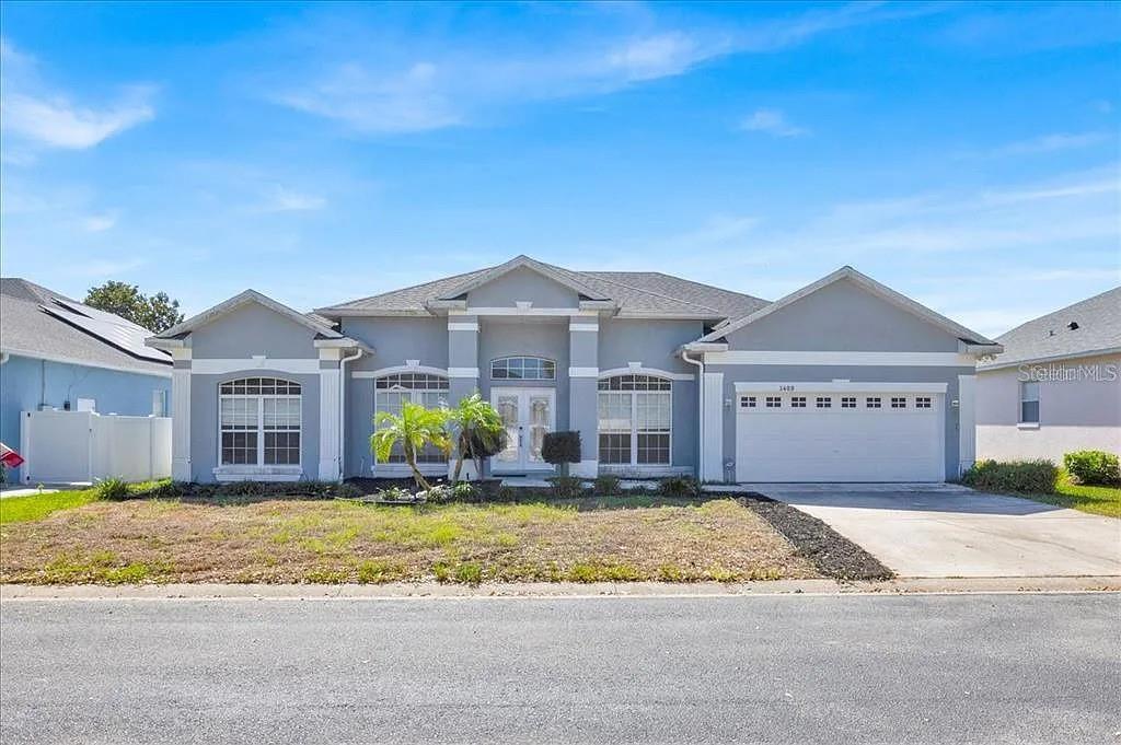 THIS STUNNING GOLF COURSE 24 HOUR MANNED GUARD GATED COMMUNITY IS WAITING FOR YOU!!!!This open floor plans shows like a model home! It has a separate office/den, 42" white kitchen Cabinets, Granite counters, The Flow of this home is super inviting and has a fully cover and screened in Lanai that is one of the largest I have come across!!! Truly a masterpiece. Don't wait to view this home... It's close to