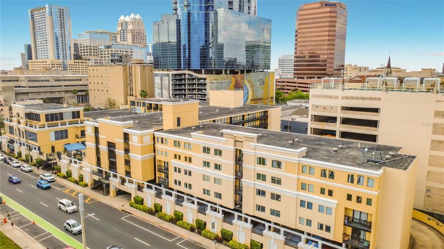 Your urban oasis awaits in the heart of Downtown Orlando! This beautifully maintained 2BR/2BA unit at The Metropolitan puts you directly across from Lake Eola Park, home to swan boats, Sunday Farmers Markets, and year-round festivals. Spanning 831 SF, this unit features an open-concept living area with light, aesthetic tones, and high-quality flooring. Enjoy the ultimate convenience of a walkable lifestyle with Publix, the Dr. Phillips Center, and vibrant nightlife just a short stroll away. Building highlights include a resort-style pool deck, a fully equipped gym, and a clubhouse perfect for entertaining. Secure building access and assigned garage parking provide peace of mind in this bustling city center. Whether you're looking for a turnkey residence or a rental-ready property, this condo offers exceptional value in Orlando's premier location.