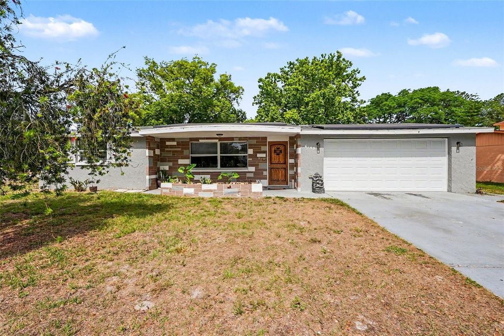 Photo of 6145 Maplewood Drive, New Port Richey, FL 34653 (MLS # TB8503971)