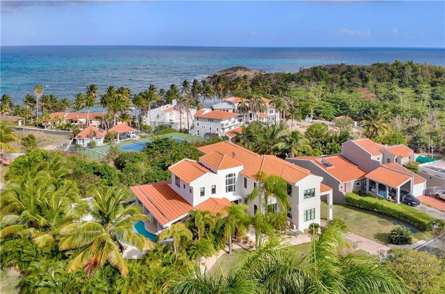 Finished in March of 2021, 43 Shell Castle offers a fully renovated, meticulously detailed, and marvelously staged from head to toe, ocean view home in Palmas del Mar. Rare to find, and totaling two + years of work, this well thought out footprint was expanded to include an abundantly lush exterior living, encompassing a fully enclosed property line, multiple grassy areas, full summer kitchen with bar, outdoor seating, dining and sunning areas, as well as full length outdoor inground swimming pool and Jacuzzi. Spanning three floors, the expansive layout of indoor living includes 7 bedrooms of which 2 serve as convertible office and rec room, 7 full bath and 2 partial. Your basement level features a full theater room with noise canceling shades, full interior bedroom/rec room and bath. Separate entrance is accessible through the covered golf cart parking.

No detail has been left untouched, with the maximum use of each uniquely designed space considered, for the incoming owners. You need only bring your suitcase to this marvelous home.

Double height ceilings in both main living areas mean 12 ft on the lowest and 22 ft on the pinnacle, with 17ft on the average, for maximum natural light, throughout. Custom work influences the entirety of the renovation with the incoming owner benefiting from the extreme attention to detail, inclusive of the double area kitchen hosting Italian cabinetry 6 burner gas range, white custom chef grade appliances and butlers areas for service.  One would be hard pressed to find a totality of space, so unique on market, today. From windows to baseboard, no expense has been spared.

The total footprint of 7,547 sq.ft  includes approx 5,047 interior living as well as 2,500 sq.ft of outdoor covered living, facing east towards the ocean, and boasting spectacular ocean views throughout.

A truly custom piece, 43 Shell Castle in Palmas del Mar is sure to excite.

The home is being sold fully design inclusive, with all furniture lighting and fixtures turn key.

Annual PHA HOA - $900