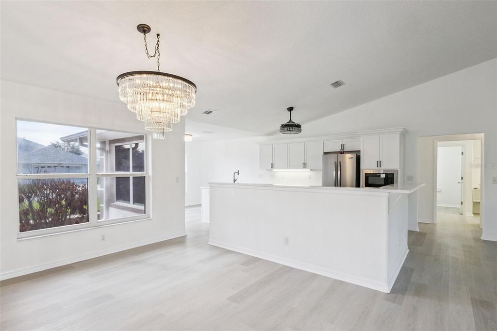 Photo of 5729 King James Avenue, Leesburg, FL 34748 (MLS # TB8488786)