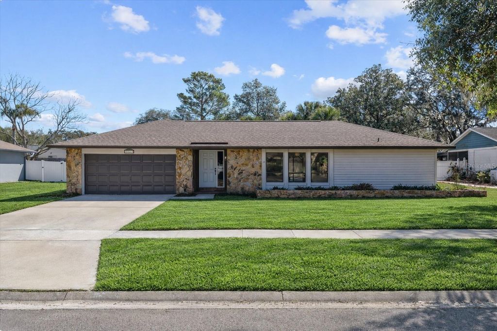 Photo of 9528 Lake Douglas Place, Orlando, FL 32817 (MLS # O6385746)