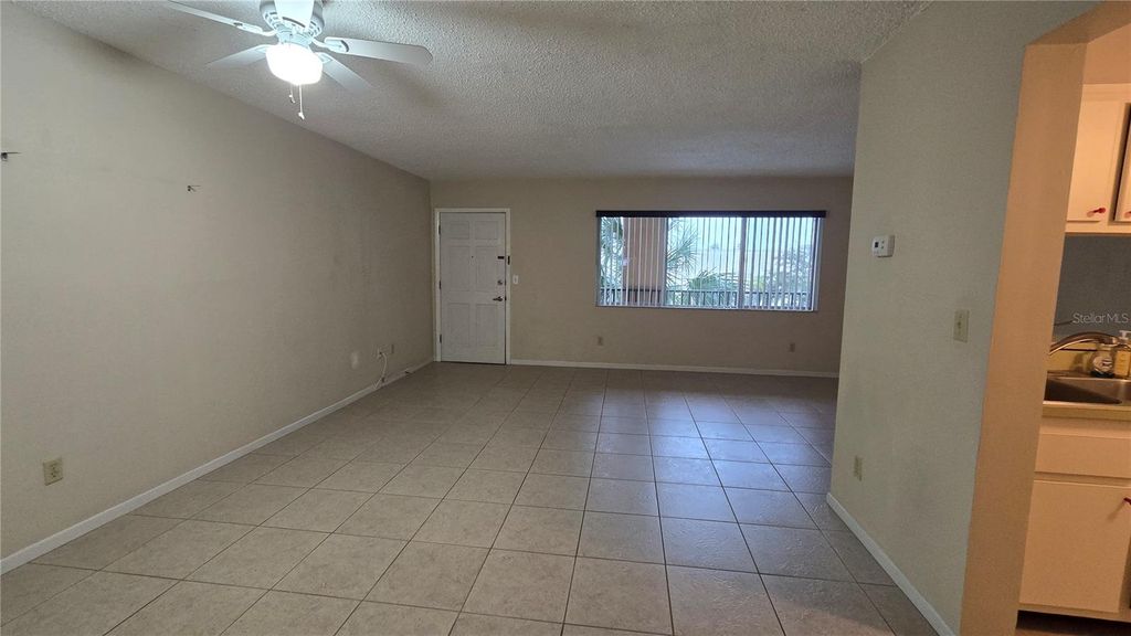 Photo of 2525 W Bay Drive #C33, Largo, FL 33770 (MLS # TB8495676)