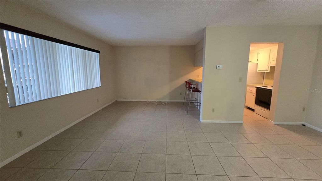Photo of 2525 W Bay Drive #C33, Largo, FL 33770 (MLS # TB8495676)