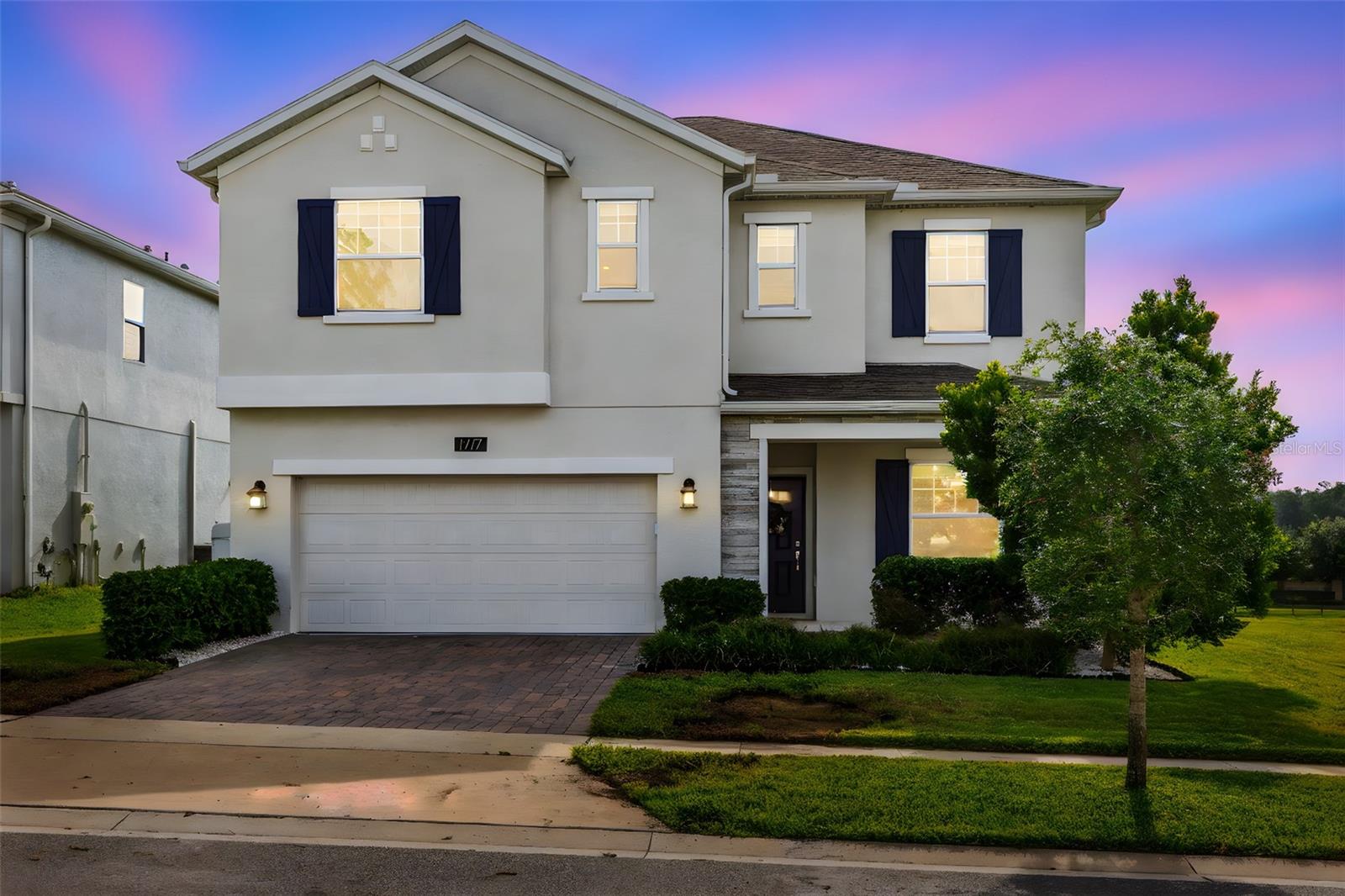 Welcome to this stunning 5-bedroom, 3-bathroom move-in ready home, located in the highly desirable GATED COMMUNITY of Arden Park. This neighborhood offers exceptional amenities including scenic walking trails, a community swimming pool, clubhouse & fitness, tot lot, and playground, parks including a dog park—all conveniently situated near the West Orange County Trail. Nestled on a quiet cul-de-sac, 1717 Sourwood welcomes you with an abundance of natural light throughout the home. The first floor features a versatile flex/bonus room, a spacious eat-in kitchen with quartz countertops, 42” upper cabinets with crown molding, stainless steel appliances, and pendant lighting that highlights the breakfast bar. The kitchen opens seamlessly to the family room, perfect for entertaining. A guest bedroom and full bathroom are also located on the main floor. Upstairs, you'll find another flex/bonus space, along with the primary suite featuring an en-suite bathroom with quartz countertops, dual sinks, a garden tub, and a separate walk-in shower. Three additional bedrooms, another full bathroom, and a laundry room—complete with included washer and dryer—are also located on the second floor. Relax and unwind on the large, screened-in back porch overlooking a peaceful green space with no rear neighbors. As an added bonus, the seller is including a whole-house water softener. Located within close proximity to major highways, shopping & eateries!