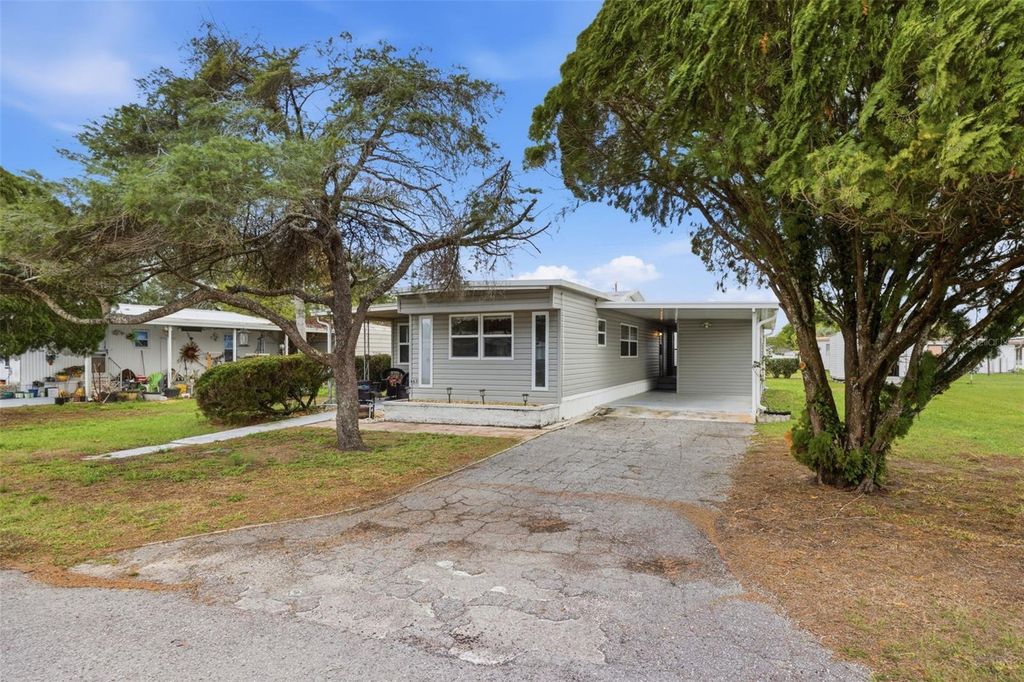 Photo of 4833 Royal Palm Drive, Zephyrhills, FL 33542 (MLS # TB8486929)