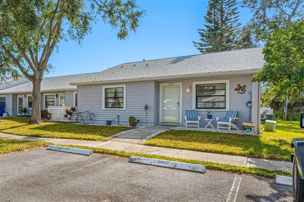 Photo of 1125 Somerset Circle S, Dunedin, FL 34698 (MLS # O6378039)