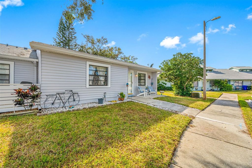 Photo of 1125 Somerset Circle S, Dunedin, FL 34698 (MLS # O6378039)