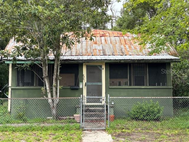 This property presents as a 4-bedroom, 1-bathroom home and is ready for your vision and renovation skills. A true handyman special, it offers strong bones and plenty of potential for customization or investment. Situated on a spacious lot with a fenced yard, there’s room to expand, garden, or create the outdoor living space of your dreams. Driveway parking included. Utilities are currently off—bring your flashlight and imagination. Whether you're looking for a project home or an investment opportunity, this one is worth a look!