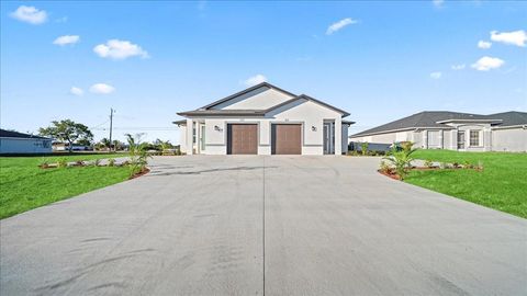 Photo of 1323 NE 8th Place, Cape Coral, FL 33909 (MLS # A4686278)