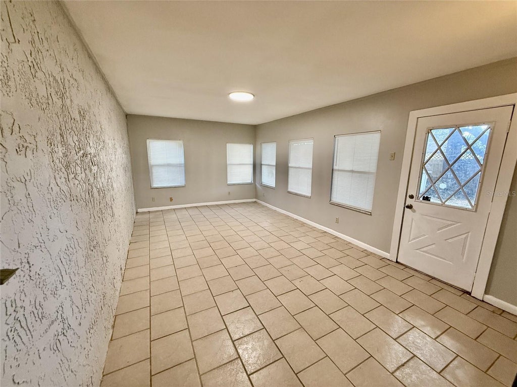 Photo of 5490 Britan Drive, Orlando, FL 32808 (MLS # S5156766)