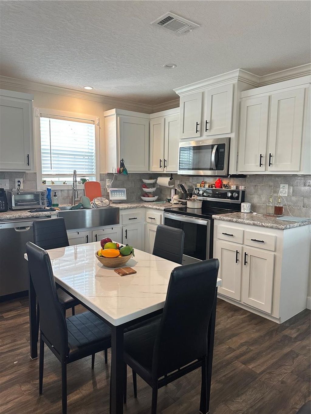 Photo of 6867 NE 5th Street, Ocala, FL 34470 (MLS # OM720102)