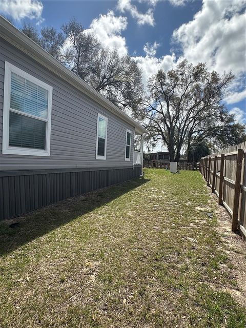 Tiny photo for 6867 NE 5th Street, Ocala, FL 34470 (MLS # OM720102)