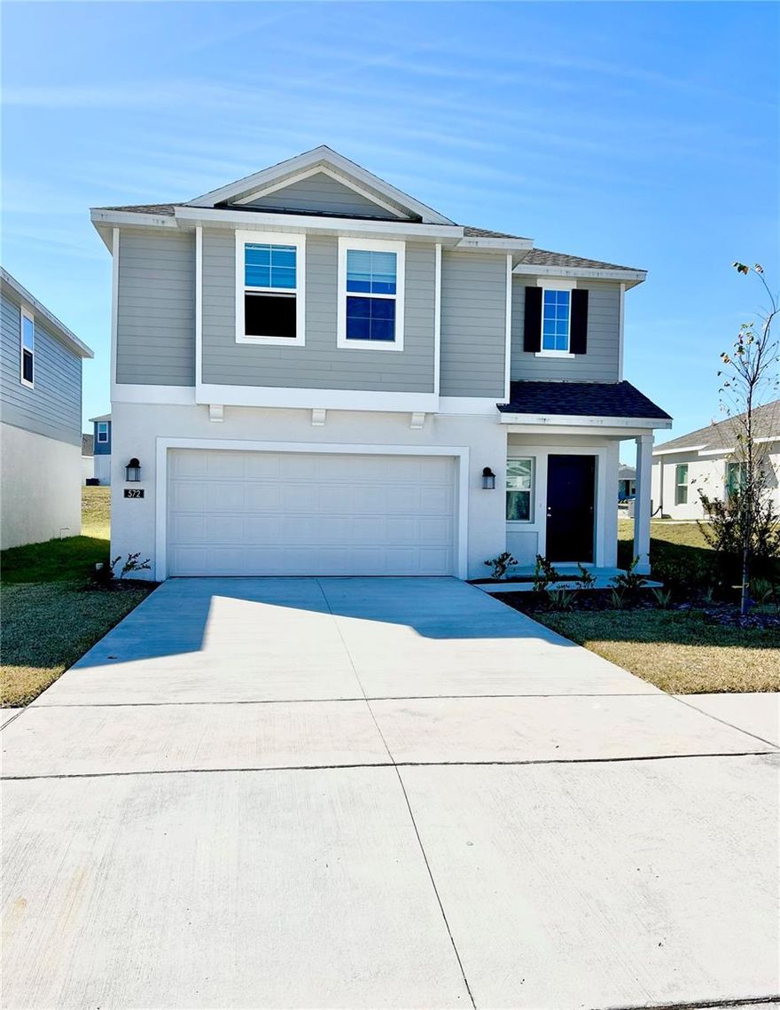 This almost 1900 sq ft beautiful two-story home features four bedrooms, two and a half baths, and a two-car garage. The perfect plan with the perfect color scheme makes this home stand out compare to others that are similar. It provides an open floor plan with great room, dining room, and kitchen with large island. The kitchen features ample counter space, and generous pantry. The casual dining area allows outdoor access to a large backyard via sliding glass doors. The second floor includes an owner's retreat featuring an owner's bath with large walk-in shower, dual vanity, and spacious walk-in closet. Three additional bedrooms, a bathroom, a spacious loft, and laundry room finish off this beautiful home. This home comes fully equipped with Everything Included Features like new appliances, solid surface countertops throughout and oversized tile flooring in the wet areas. Peace Creek Reserve is a masterplan community of new single-family homes with a beautiful natural creek. Winter Haven is the chain of lakes city, with over 26 linked together by canal. There are lots of shops, restaurants, bike paths. Peace Creek Reserve is what you have been looking for. A safe small town feel with convenience, the perfect place to live.