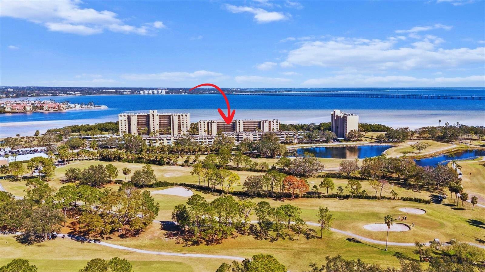 Discover the beauty of waterfront living in this stylishly updated 2-bedroom, 2-bath condo at sought-after Cove Cay Village 1 in Clearwater. Perched on the 6th floor, this 1,050 sq ft home offers sweeping views of Old Tampa Bay from the main living areas and enclosed porch, creating a peaceful, coastal backdrop to everyday life. Step inside to a light-filled, open layout accented with sleek tile flooring throughout. The kitchen stands out with granite countertops, crisp white cabinetry, matching appliances, and a tray ceiling with crown molding detail. Recent upgrades include a brand-new kitchen faucet and updated plumbing, adding both style and functionality. The adjoining dining area flows seamlessly into the oversized living room, where a wall of windows frames the sparkling bay. The primary suite features a generous walk-in closet and an ensuite bath with dual sinks and a walk-in shower. The second bedroom is well-sized and situated near the guest bath with a tub/shower combination. Your own private laundry and storage room—located just steps from the front door on the same floor—offers convenience and extra space. Cove Cay Village 1 delivers a resort-like lifestyle with a renovated clubhouse, card and social rooms, sauna, fitness center, heated pool and spa, and shuffleboard courts. Optional memberships are available for golf at the Cove Cay Golf Club or boating at the Cove Cay Marina. With its prime location, upgraded finishes, and unmatched water views, this home is move-in ready for your next chapter in Florida living. Schedule your private showing today. Kitchen appliances, countertop, cabinets done in 2017. Primary bath full upgrade 2017, tile floor throughout 2017, roof replaced 2020. Some electrical outlets updated 2025, interior paint 2023, kitchen faucet and plumbing 2025. New A/C 2022.