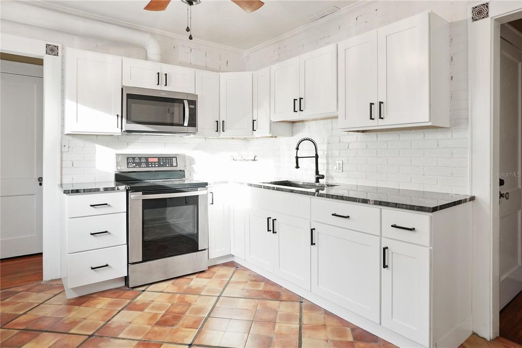 Photo of 1013 Magnolia Drive, Clearwater, FL 33756 (MLS # C7520606)