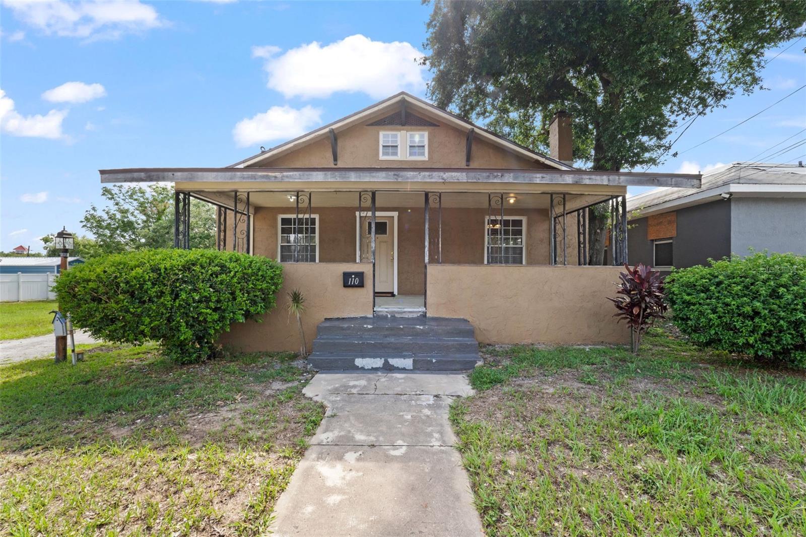 One or more photo(s) has been virtually staged. Auction Property. 2 Story spacious with Endless Potential!
Don’t miss this spacious 2-story home located near Downtown Haines City and the beautiful Lake Eva Community Park. This residence features 4 generously sized bedrooms and 2 full baths. The upstairs offers unique tandem rooms—great for converting into home offices, study areas, or additional living space.
Step inside to a large living room with a classic fireplace and enjoy gatherings in the formal dining room. The kitchen awaits your vision and remodeling touch. Period details such as original wide trim and vintage moldings add to the home’s appeal. Relax with your morning coffee on the expansive front porch or take advantage of the large backyard workshop for hobbies or extra storage.
This home is being sold in as-is condition through an online auction platform. This home is ideal to purchase with a renovation loan that will also finance the property's repairs. Contact us today for additional information. Don’t wait—schedule your showing today and bring this historic gem back to life! Auction buyer premium applies.
