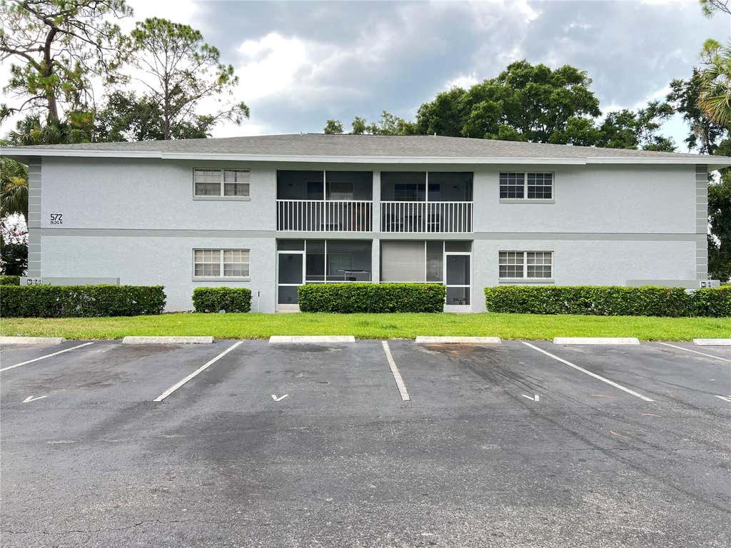Photo of 572 SE Fairways Lane #N204, Ocala, FL 34472 (MLS # OM727872)