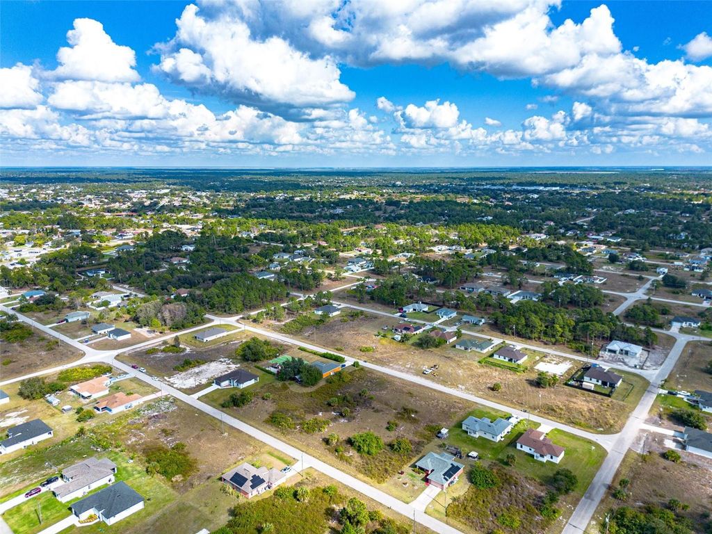 Photo of 739 Knox Avenue S, Lehigh Acres, FL 33974 (MLS # O6368620)