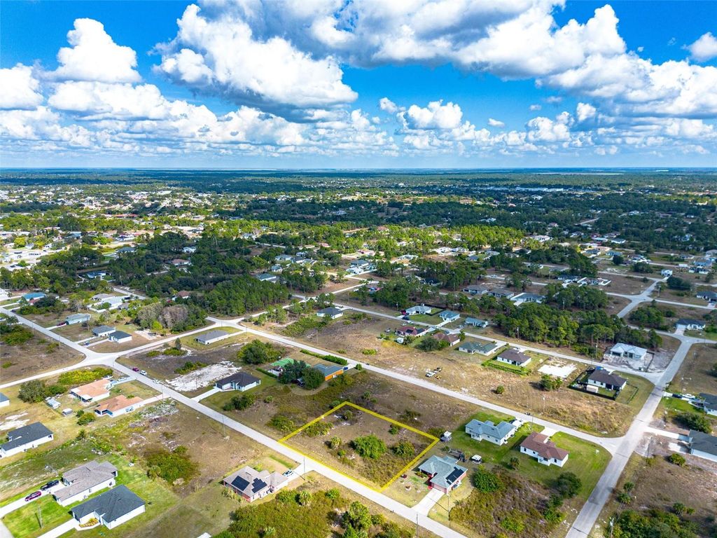 Photo of 739 Knox Avenue S, Lehigh Acres, FL 33974 (MLS # O6368620)