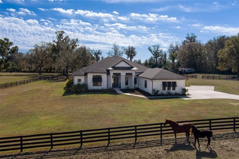 Photo of 11920 SE 22nd Ave Road, Ocala, FL 34480 (MLS # OM729878)