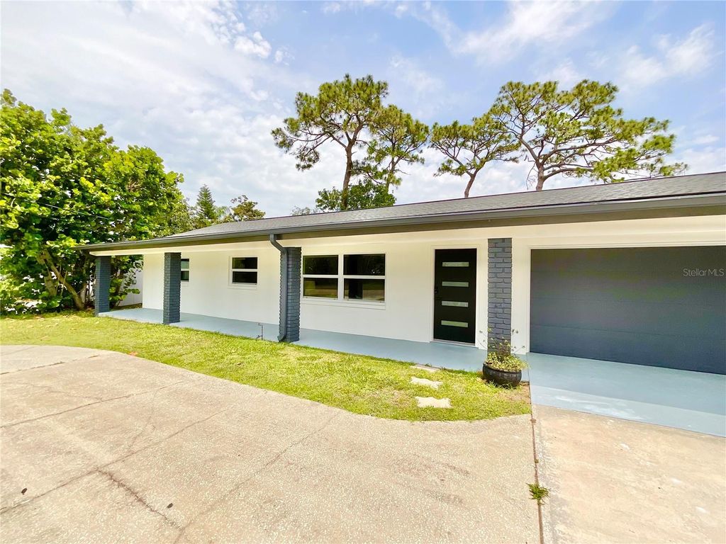 Photo of 1290 Michigan Boulevard, Dunedin, FL 34698 (MLS # TB8389154)