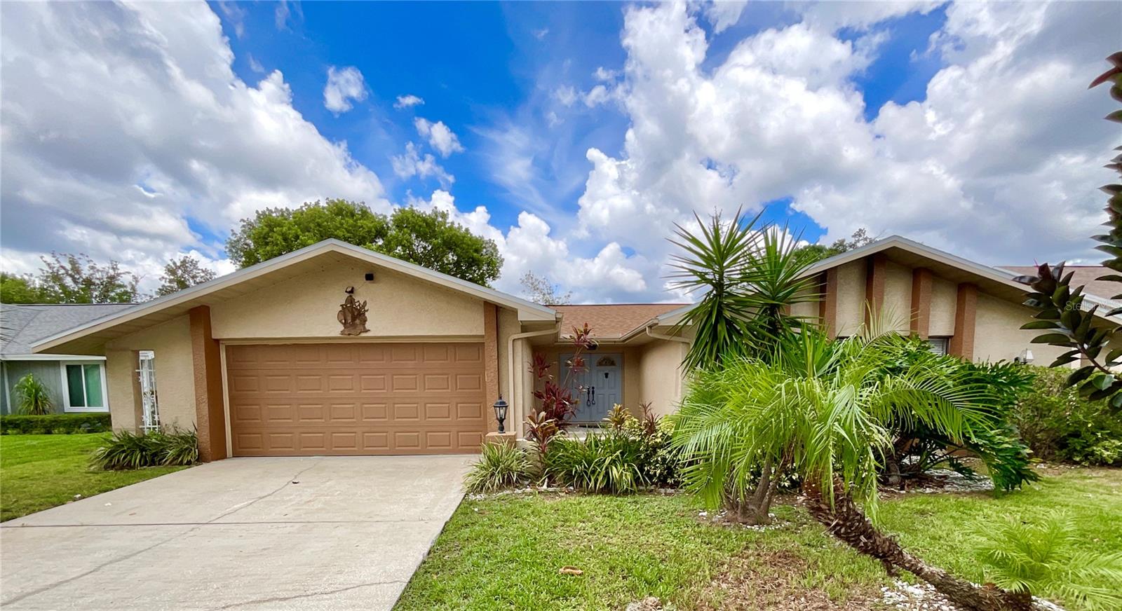 Beautifully Remodeled 3-Bedroom Home in Prime Palm Harbor Location
This stunning 3-bedroom, 2-bathroom home with a spacious 2-car garage is located just off Tampa Road—close to top-rated schools, major highways, and only minutes from Tampa and the nearby beaches.
Inside, you’ll find an updated eat-in kitchen featuring a center island with a quartz breakfast bar, stainless steel appliances, and a view into the inviting family room with cathedral ceilings and a cozy wood-burning fireplace. The split floor plan offers added privacy, with bedrooms 2 and 3 on one side of the home, along with a remodeled full bath featuring a specialty tub designed for easy access—ideal for seniors.
The master suite is generously sized, boasting a large walk-in closet and a beautifully renovated en-suite bathroom with dual vanities and a newly tiled shower.
Additional highlights include:
• Light-filled living room with cathedral ceilings and a large picture window overlooking the lanai
• Laundry area in the garage with washer, dryer, and utility sink
• Tiled, screened lanai with an attached deck and electric-powered sunshade
• Fully fenced, landscaped backyard with serene views of the green space behind
Lawn service is available for an additional fee.
?? Call today to schedule your private showing!