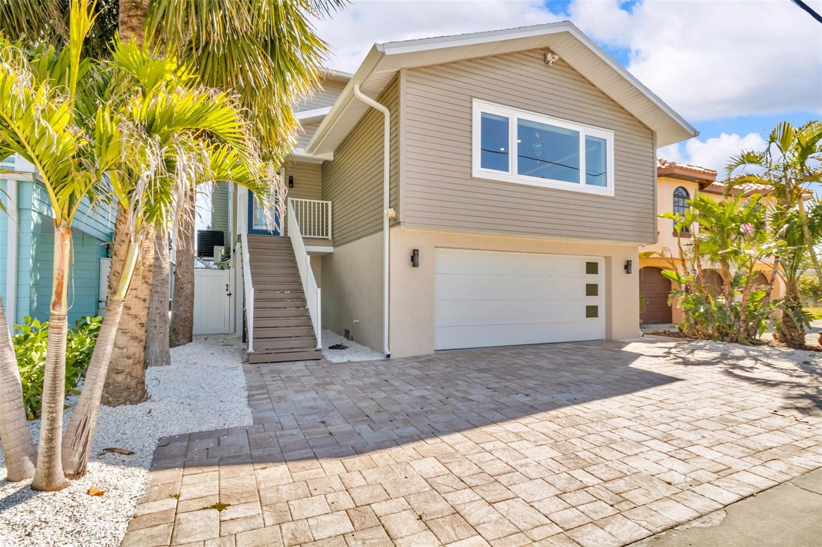 Live the Dream on Treasure Island!
Imagine waking up to serene water views, spending your days cruising through the Intracoastal, and walking to the sugar-sand beaches just two blocks from your front door. This fully renovated waterfront retreat delivers the best of Treasure Island living—where every day feels like a vacation.
Tucked along a peaceful canal with TWO private boat docks and quick access to John’s Pass, this is a boater’s paradise with the beach just steps away via a public walkway across Gulf Blvd. Whether you're heading out on the water or strolling to catch the sunset, location truly doesn’t get better than this.
Inside, the open-concept main floor welcomes you with coastal charm and contemporary upgrades—from the airy living room and chef’s kitchen to a cozy media room and a massive butler’s pantry perfect for entertaining. Upstairs, the primary suite offers luxury and relaxation, with spa-like finishes and a private balcony overlooking the water. Each bedroom offers postcard-worthy views and access to a well-designed guest bath.
Step outside to enjoy your own slice of paradise:
Covered full-width decks for morning coffee or sunset cocktails
Outdoor kitchen, jacuzzi, and resurfaced pool (March 2025)
Private sauna + sports room on the ground floor
Boat docks with lifts, ready for your next adventure
With hurricane-impact windows and doors, a newer roof (2017), and beautifully updated interiors, this home is move-in ready and built for peace of mind.
Whether you're seeking a full-time residence or an unforgettable vacation home, this is your chance to embrace the laid-back, luxury lifestyle of Treasure Island.
Schedule your private tour today—and start living the coastal life you’ve been dreaming of.