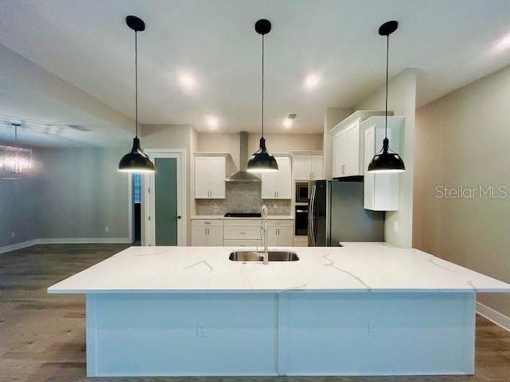 Photo of 4000 Southern Valley Loop, Brooksville, FL 34601 (MLS # TB8311664)