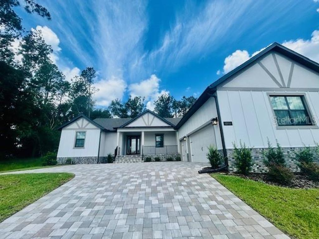 Photo of 4000 Southern Valley Loop, Brooksville, FL 34601 (MLS # TB8311664)