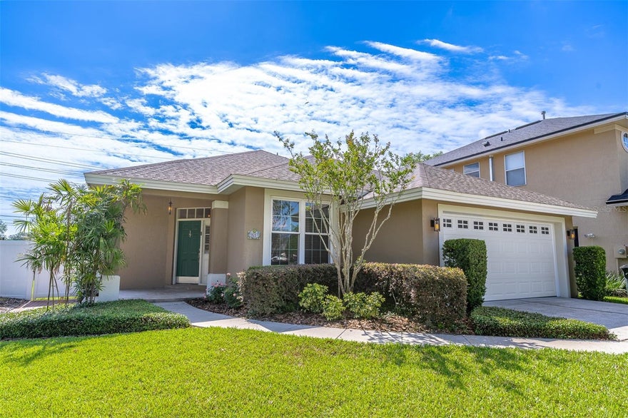 One or more photo(s) has been virtually staged. This gem is situated in the Brittney Gardens gated neighborhood in desirable Maitland. When you enter the home you are greeted by beautiful, rich wood floors and loads of natural light. The dining room flows seamlessly into the kitchen for ease when entertaining. The kitchen boasts quartz countertops, stainless-steel appliances, ample cabinet and counter space, breakfast bar & closet pantry. The kitchen overlooks the living room, which provides glass doors, complete with retractable screens, leading to the screened-in patio. The primary bedroom is a true private retreat and is on the opposite side of the home from the secondary bedrooms. The primary retreat includes a walk-in closet with a closet system and a spa-like ensuite bathroom with a dual sink vanity. The secondary bedrooms are across the home and share a hallway bathroom. The screened-in patio overlooks a rear paver patio which provides the perfect outdoor space to enjoy the Florida lifestyle. Other amenities and updates include a whole house generator, recently repainted interior, LED lights, new carpet in all the bedrooms, and a new tankless water heater. HVAC was installed in 2024.  This home is close to several restaurants and shops and is just a short distance from both the newer Maitland City Center and famed Park Avenue in Winter Park. Welcome Home!