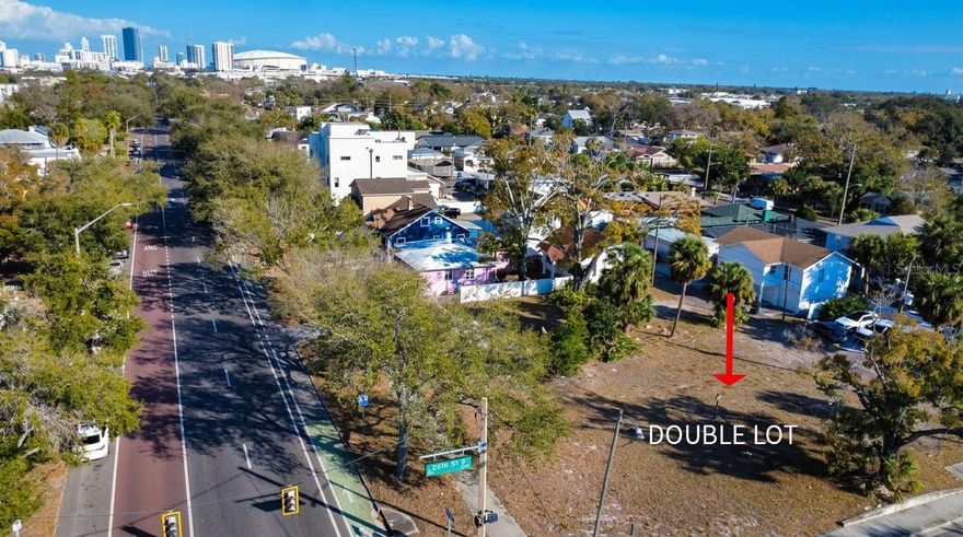 Prime development and investment opportunity in one of St. Petersburg’s fastest-rising urban corridors. This nearly 10,000 SF double corner lot is zoned CRT-1, allowing up to five units. CRT-1 allows for a roof peak height of up to 36 feet for this lot, creating strong potential for a three-story project. The corner configuration creates a major advantage for site planning, allowing for enhanced frontage, additional windows, more natural light, larger outdoor living spaces, and stronger overall curb appeal.

Surrounded by new luxury homes, modern townhomes, and ongoing development, the property is ideally positioned for builders, developers, or investors seeking to capitalize on the continued growth of the Grand Central and Palmetto Park corridor. For those looking to secure land in a neighborhood on the rise, this site also offers compelling long-term value as the surrounding area continues to transform.

Located just minutes from Central Avenue, Downtown St. Petersburg, the SunRunner, and the Tropicana Field / Historic Gas Plant District redevelopment area, the property benefits from proximity to some of the city’s most significant lifestyle and redevelopment drivers. With select nearby new construction homes selling for over $1.5M, this is a rare opportunity to acquire a highly functional double corner lot in the path of growth.