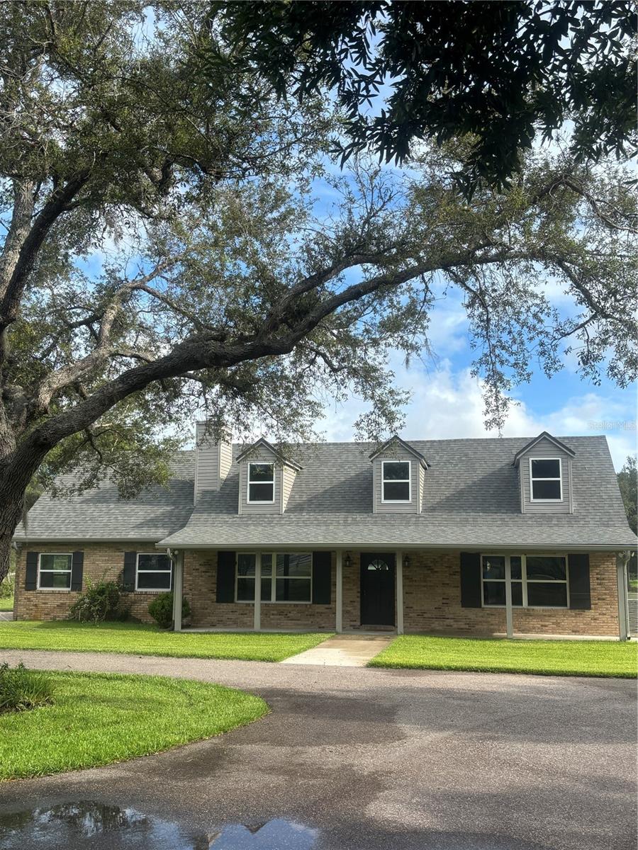 BRING YOUR HORSES and all of your toys ... the Country life is Calling! Five beautiful cleared, partially fenced acres, in the highly sought after neighborhood of SEMINOLE ESTATES. This property backs up to the 1600 Acre Seminole County Black Bear Wilderness Area for even more seclusion and privacy. You will enjoy the sights and sounds of nature at its best in this serene environment as you watch white tail deer, sand hill cranes, and wild turkeys as they pass through your property. This property is very secluded but close to restaurants, shopping and Interstate 4. The roads are private so there is plenty of room for riding. This home includes 2750 square feet under air, including 4 bedrooms and 4 baths, family room, office, updated kitchen, indoor laundry, large storage room/pantry, TV/playroom, Main bedroom/ensuite, office/den/exercise room; 2 bedrooms (Main), 2 baths, storage & laundry on ground floor, 2 beds, 2 baths, TV/playroom upstairs. Hardwood, tile, & luxury vinyl plank (LVP) flooring throughout, all new double pane windows (2024), 6 year old roof, 6 & 7 year old central air conditioners (2). This home also includes 960 additional enclosed square feet, including a glass enclosed tiled Florida room and a detached 3 car garage/workshop/tack room (720’') with new Hardie board siding, electrical wiring (220V), lights, outlets, windows & doors. This property has been cleared and newly seeded and sodded with St. Augustine grass and a new Irrigation System with 7 zones has been installed. it has a 14x30 concrete RV pad with 220V outlet for RV hookup, a playground area, 8'x8' outdoor potting shed/she shed; front porch, wood burning fireplace, jetted tub, stainless steel appliances, 6 burner gas stove, farm sink and has been recently painted inside and out. This home is centrally located... only 7 miles to Auto Train/ Sun Rail; 12 miles to Orlando/Sanford Airport; 19 miles to Daytona International Speedway; less than 35 miles to the sands and shores of World Famous Daytona Beach and New Smyrna Beach, 40 miles to Orlando International Airport; 49 miles to Disney World and 56 miles to Kennedy Space Center. For those who love to fish, it is less than 1 hour to Ponce de Leon Inlet for offshore fishing or World Famous Mosquito Lagoon for those who prefer inshore fishing. Lake Monroe and the St. John's River are less than two miles away if you prefer freshwater fishing.