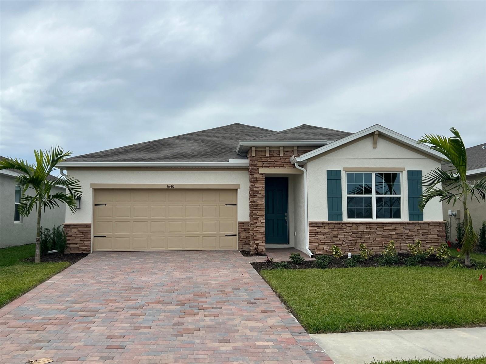 ANNUAL/UNFURNISHED - 3 BEDROOM 2 BATHROOM 2 CAR GARAGE - Welcome to this Clifton model home in The Cove at West Port!!! This immaculate lakefront property with a *screened lanai* is ready for you!!! Features include brick paver driveway, granite countertops in the kitchen and bathrooms, stainless appliances, ceiling fans in every room with remotes, and tiled showers/tubs... Washer/Dryer Included!!! Amenities include Clubhouse with gym, kitchen, pool table room, activity area and beyond... Oversized pool with lap swimming lane and private cabanas. 4 Pickleball courts!!! Centrally located to shopping malls, Stone crabs stadium, beaches, centennial park, walking trails and much more!!! 1 Small Dog Friendly!!! Call today for a private showing!!