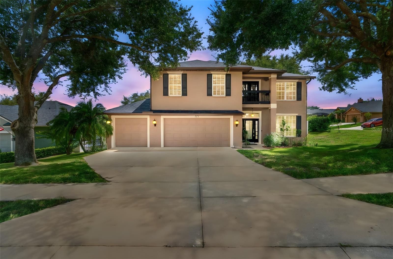 This corner lot, well updated DeBary Plantation home with a BRAND-NEW ROOF in 2025 and NEWER AC system in 2024 (the other is new in 2020) is ready to go! Boasting a 3-car garage and vinyl fenced back yard, this home is loaded with features. Inside, the spacious kitchen features granite countertops, 42” cabinets with crown molding, stainless steel appliances including the brand-new refrigerator and recessed lighting. One main living area has an electric fireplace while the other is adjacent to the kitchen and includes soaring ceilings and flows to the screened porch in the private back yard. The huge primary bedroom suite features a balcony, dual walk-in closets, and the ensuite bath includes a garden bath, dual sinks, water closet and walk-in shower. The private, rear screened porch in the fully fenced back yard has lake views and ceiling fans. Additional features include bullnose drywall, keyless front door, security and irrigation systems, tons of parking, and access to multiple swimming pools, including the one just down from your new home at the end of the cul-de-sac. DeBary Golf and Country Club is just down the street, whether you’re looking for the driving range, some golf, or just a quick meal in the restaurant. Ask your Realtor® for the link to the unbranded virtual tour of this amazing home. All measurements are approximate and should be independently verified.