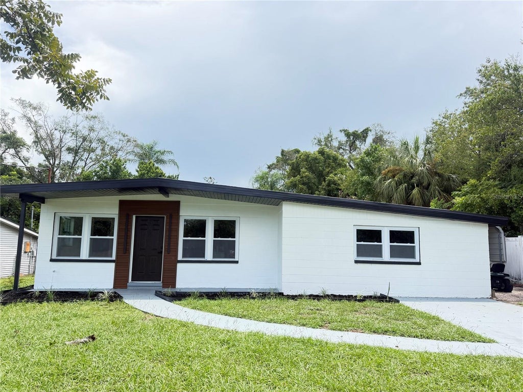 Photo of 9505 N Willow Avenue, Tampa, FL 33612 (MLS # TB8542566)