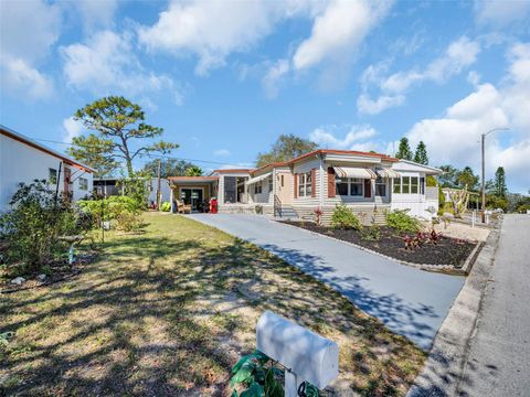 Photo of 807 Saint Charles Drive, Tarpon Springs, FL 34689 (MLS # TB8355928)