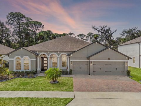 Photo of 1087 Conestoga Way, Sanford, FL 32771 (MLS # O6353036)
