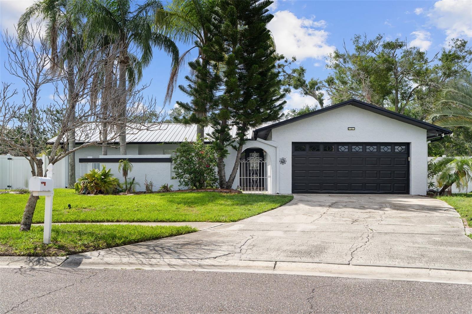 Introducing a great waterfront home in Tampa Shores, this captivating 3-bedroom, 2-bathroom pool home offers the perfect blend of Florida lifestyle, convenience, and comfort. Nestled in a quiet, no-HOA community, the property features direct canal access to upper Tampa Bay. install a private boat lift, allowing you to navigate easily to Tampa Bay and the Gulf of Mexico. A deep-water dock also provides the ideal spot for morning coffee, fishing, or enjoying tranquil evening sunsets.
The home’s inviting interior features a thoughtful layout, including a separate living room, a formal dining room, and a charming breakfast nook. At the heart of the home, the galley-style kitchen features stone countertops and dual sliding doors that open directly to the screened pool lanai, creating a seamless flow between indoor and outdoor living. Recent upgrades include newly installed laminate flooring and a durable metal roof, while the converted garage—currently a playroom with epoxy flooring—offers versatile living space that can easily be returned to its original use. The garage has been made into a large man cave (BUT STILL HAS GARAGE DOOR AND CAN BE CONVERTED BACK TO GARAGE IF DESIRED) with mancave livable space is close to 1900 sq ft
Outside, the caged pool and screened lanai provide a perfect setting for entertaining or simply relaxing after a day on the water. The large side yard offers plenty of room for parking boats, jet skis, or an RV, giving you flexibility to enjoy the waterfront lifestyle to the fullest.
Located minutes away from Tampa’s vibrant dining scene, residents can enjoy local favorites such as La Teresita for authentic Cuban cuisine or Ulele on the Riverwalk for native-inspired dishes and craft brews. Grocery shopping is convenient with nearby markets, and families will appreciate being part of the Hillsborough County School District, known for its strong educational programs.
Currently used as an Airbnb. This charming waterfront retreat is available fully furnished and presents an excellent opportunity for short-term rental income or personal enjoyment. This home is Move-in ready and designed for great waterfront living