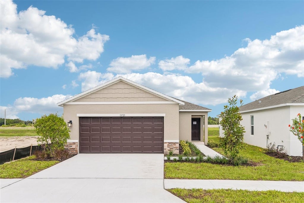 Photo of 13721 Squall Lane, Hudson, FL 34669 (MLS # TB8543186)