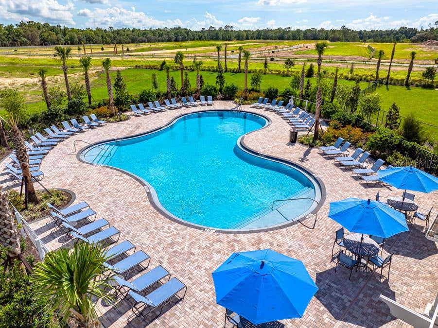 Photo of 13721 Squall Lane, Hudson, FL 34669 (MLS # TB8543186)