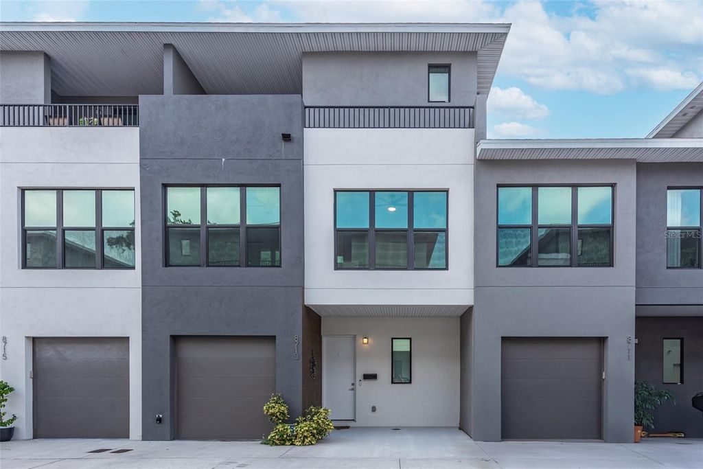 Photo of 8713 Palm Ranches Place, Tampa, FL 33614 (MLS # TB8474215)