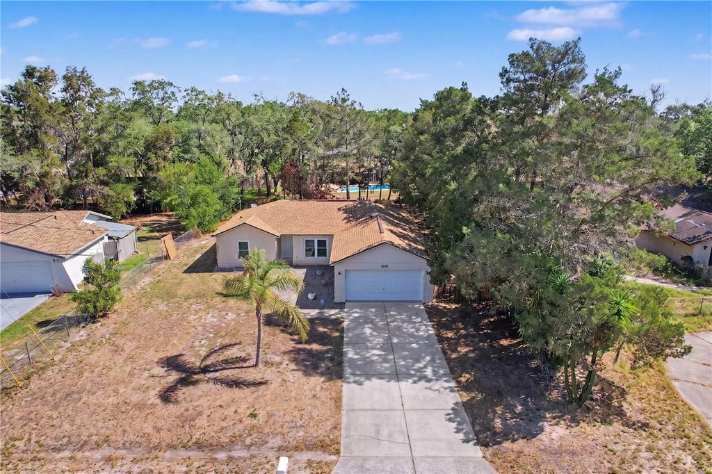 Photo of 6311 Pinehurst Drive, Spring Hill, FL 34606 (MLS # W7885281)